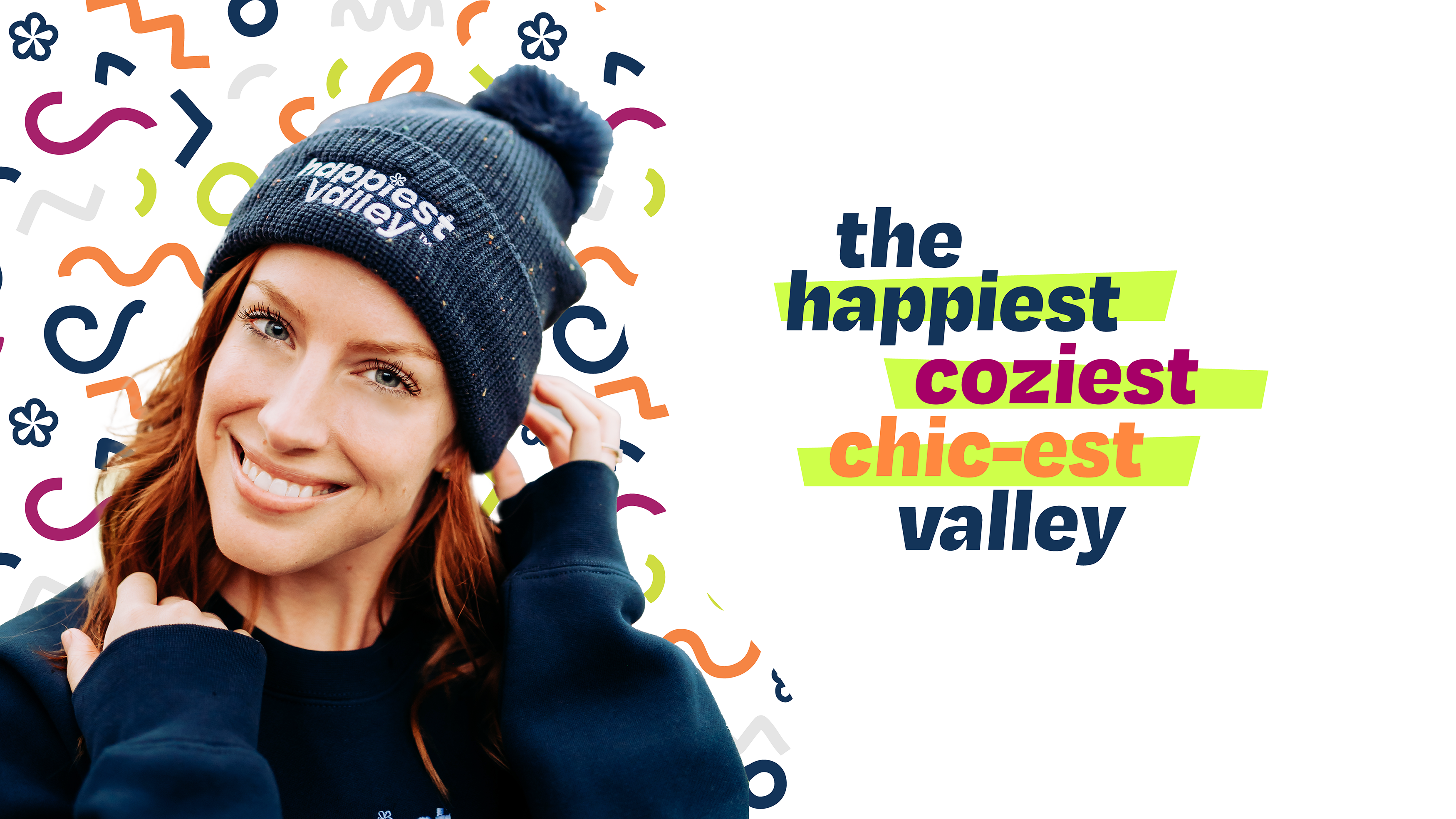 https://bonafidephoto.com Photo of @happyvalleyhannah smiling while wearing navy speckled beanie with white embroidered logo 'happiest valley.' Text reads 'the happiest, coziest, chic-set valley" in brand colors. Perfect for Penn State fans winter wear, staying cozy, and nostalgia for good times in happy valley / State College, PA